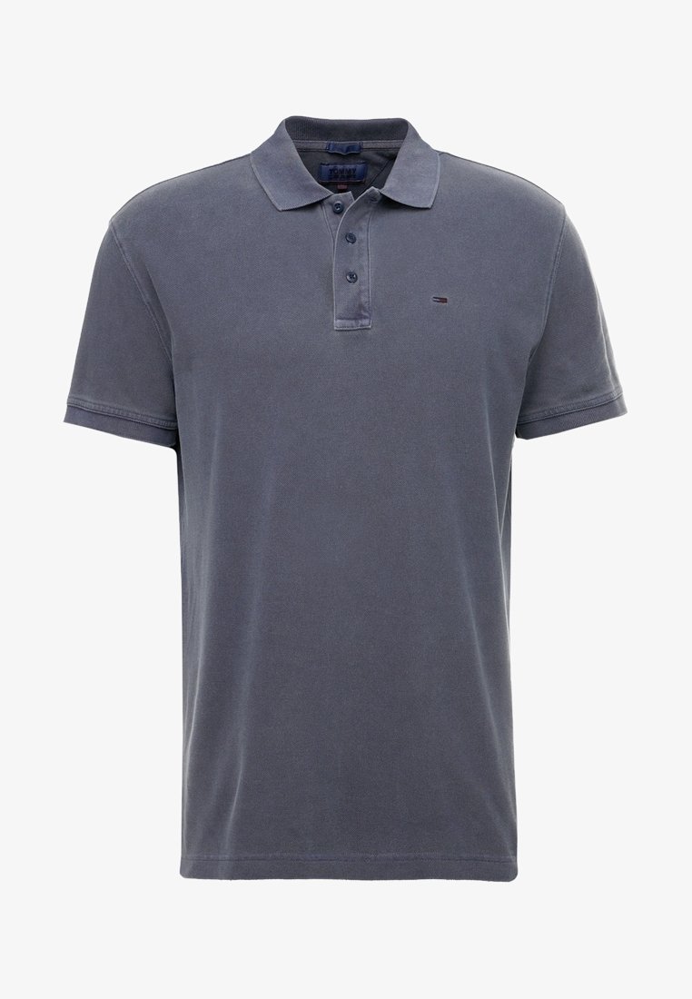 Polo pour homme bleu marine en coton avec une finition texturée. Il comporte un col classique et une patte de boutonnage à trois boutons. Petit logo sur la poitrine.