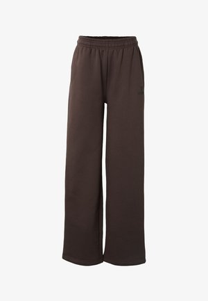 Braune Sweatpants mit weitem Schnitt, elastischem Bund und dezentem Seitenlogo auf schlicht weißem Hintergrund.