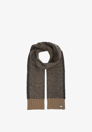 Knitted brown scarf with dark accents and ribbed beige ends, folded in a loop with one metal tag on the bottom right.