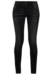 Smal svarta jeans i denim med knappstängning framtill, fem fickor och subtil blekning för textur.