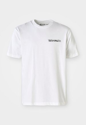White cotton t-shirt with short sleeves, round neck, featuring black text "On Vacation Out of Office since 95" on the left chest.
