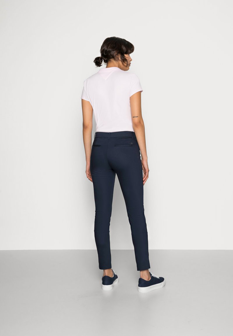 Tommy Hilfiger HERITAGE SLIM FIT PANTS - Trousers - midnight/dark  