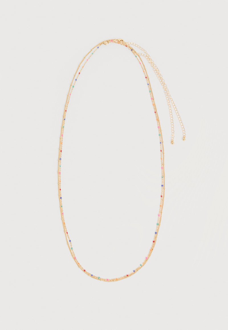 Ευαίσθητο χρυσό κολιέ με μικρές πολύχρωμες χάντρες τοποθετημένες ομοιόμορφα, με ρυθμιζόμενο κούμπωμα και επιμηκυντή αλυσίδα.