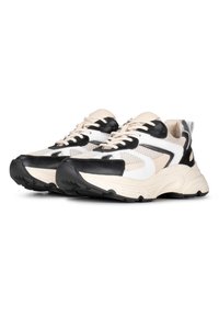 Klumpige Sneakers in einer Farbkombination aus Schwarz, Weiß und Beige. Sie sind aus Netzstoff und mit glatten Lederakzenten versehen und haben eine strukturierte Gummisohle.