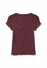 Bordeauxfarbenshirt mit kurzen Ärmeln, V-Ausschnitt und strukturiertem Stoff mit vertikalen Falten. Frontknopfverschluss mit runden Knöpfen.