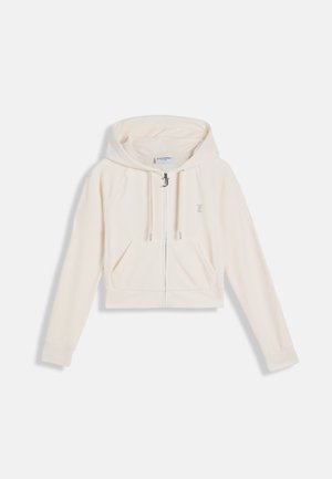 Krémovo sfarbená mikina na zips so sťahovacími šnúrkami, prednými vreckami, dlhými rukávmi a jemným vyšívaným logom na ľavej strane hrudníka.