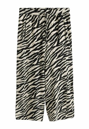 Schwarz-weiße Hose mit Zebramuster, weitem Bein, elastischem Bund und Kordelzug, mit seitlichen Taschen.
