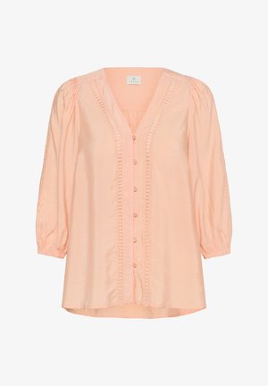 Peach-colored blouse with a V-neck, button-down front, and 3/4 puff sleeves. Features lace trim along the placket and soft fabric texture.
