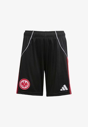 Czarne spodenki sportowe z czerwonymi paskami po bokach, elastycznym paskiem w talii oraz haftowanym logo orła w czerwieni i bieli. Zawierają także oznakowanie Adidas w kolorze srebrnym.