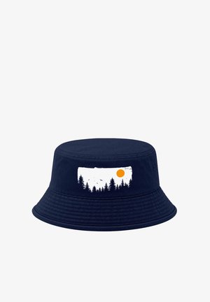 Navy blue bucket hat with a white rectangular graphic of pine trees, birds, and an orange sun on the front.