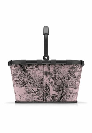 Basket with a pink fabric exterior featuring a black tree pattern, sturdy black handle, and a structured design with a flat base.