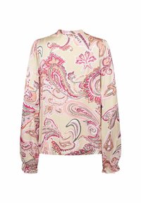 Blouse à manches longues de couleur beige clair avec un motif paisley en rose, corail et vert. Présente des poignets froncés et un col haut.