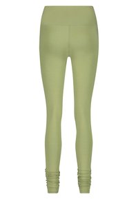 Leggings vert clair à taille haute, avec une texture lisse et des accents froncés au niveau de la cheville. Fabriqués à partir d'un matériau extensible et respirant.