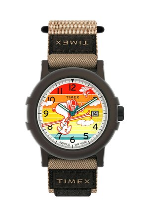 Timex ručni sat s smešnim smeškom i smešnim crtanim licem. Ima smešnu plavu plastičnu kućište, a njegova traka je bež boje. Vodootporan.