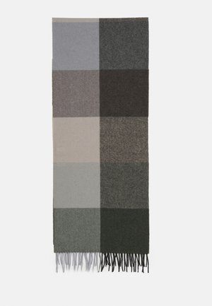 Wool scarf in a patchwork design featuring light gray, dark gray, brown, and green squares with fringe detailing at the bottom.