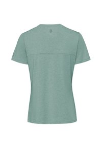 T-shirt de sport vert clair à manches courtes montré de dos avec un petit motif diamant réfléchissant sous le col.