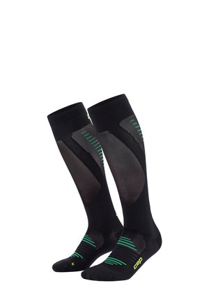 Kompressionsstrümpfe in Schwarz mit grünen Akzenten. Mit einem Mesh-Panel-Design, geripptem Textur und verstärkten Zehen- und Fersenbereichen.