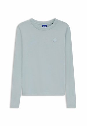 Maglietta a maniche lunghe azzurro chiaro in tessuto morbido. Presenta un collo rotondo e un piccolo logo testurizzato sul lato sinistro del petto.