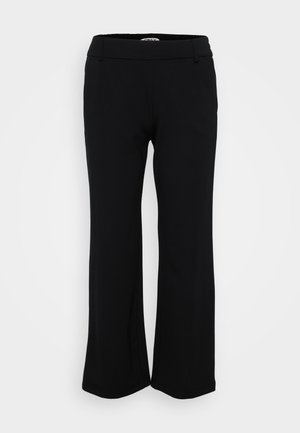 Svarta, vida byxor gjorda av mjukt, stretchat tyg. Har en slät midja med bältesömmar och fållade kanter. Enkel och mångsidig design.