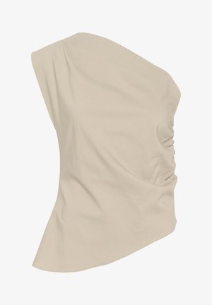 Vêtement beige à une épaule fabriqué en tissu doux, présentant une texture froncée d'un côté et une silhouette fluide avec un ourlet net.