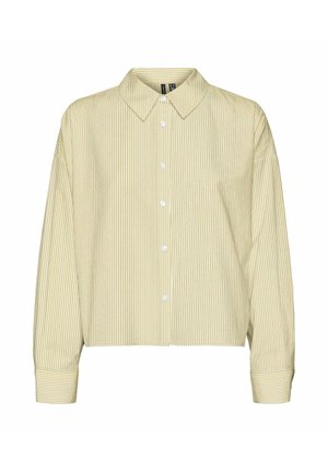 Pikad varrukad, beež ja valge vertikaalsete triipudega nööbiga särk koos terava krae ja laiade mansettidega.