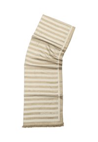 Sciarpa beige con strisce orizzontali alternate chiare e scure. Bordo finito con frange e un'etichetta intrecciata "MICHAEL KORS" vicino al fondo.