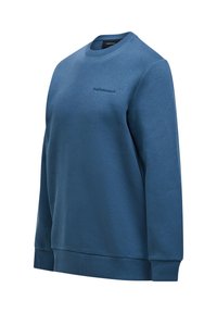 Felpa blu realizzata in tessuto morbido. Presenta un colletto rotondo, maniche lunghe e polsini a coste. Mostra il logo "PeakPerformance" in filo scuro.