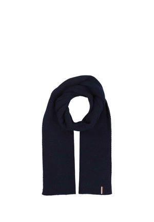 Dark navy blue ribbed knit scarf folded in a loop with a small striped fabric tag near one end on a white background.