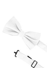 Weißes Fliegenband aus strukturiertem Stoff, ausgestattet mit einem verstellbaren Band und einer schwarzen Schnalle für einen sicheren Halt.
