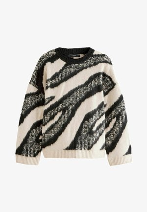 Üks suurus sobib kõigile kreemivalge ja musta värviga oversized-sviiter, millel on sebra triibuline muster. Valmistatud pehmest, tekstureeritud kangast, millel on soonikkoes mansetid ja äär.