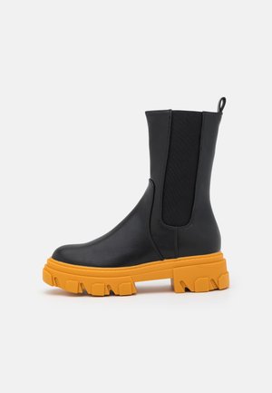 Bottines à plateau - black