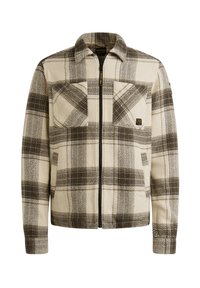 Gelaagde fleece jas in crème en bruin, met een rits aan de voorkant, twee borstzakken en een zachte textuur met een geruit patroon.