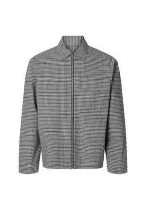 Chaqueta con cremallera de cuadros en blanco y negro, con mangas largas, cuello y bolsillo frontal en el pecho izquierdo.