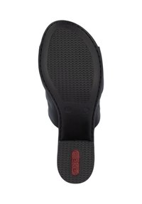 Black rubber sole with a textured pattern and Rieker logo in red. Smooth edges and a simple, functional design.
