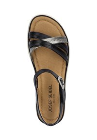 Czarne sandały z srebrnymi akcentami, z krzyżującymi się paskami i wyściełaną, beżową wkładką. Regulowany pasek z klamrą zapewniający dopasowanie. Lekka konstrukcja.