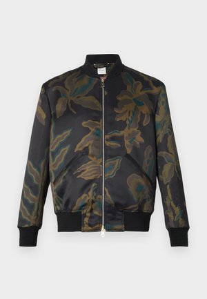 Bomber jacket in black satin with large floral camouflage print in green and brown; features zip closure and ribbed cuffs and hem.