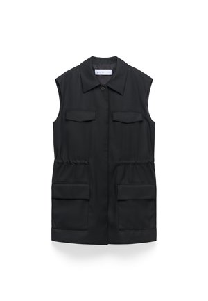 Black sleeveless vest, button closure, two chest pockets, two front pockets, elastic waist detail, smooth fabric, tailored design.
