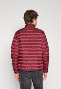 Tommy Hilfiger PACKABLE - Jachetă subțire - deep rouge