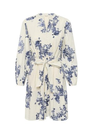 Kremna obleka z modrim cvetličnim vzorcem, dolgimi rokavi, gumbi na zgornjem sprednjem delu in pasom, ki se zaveže v vozl.