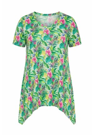Korte groene V-hals tuniek met korte mouwen, voorzien van een tropisch bloemmotief in roze, paars en diverse groene bladeren.