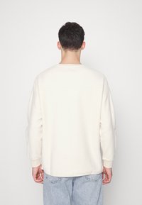 Redefined Rebel TORRES UNISEX - Camisola de lã polar - sandshell