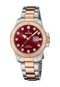 Festina kvarca pulkstenis ar apaļu bordo ciparnīcu, rozā zelta korpusu, sudraba un rozā zelta metāla siksnu, 10 bāru ūdensizturību un kristāla akcentiem.