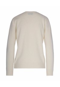Maglione a maglia beige con maniche lunghe e scollatura rotonda. Presenta polsini e orlo a costine, una fine trama e un design semplice senza motivi.