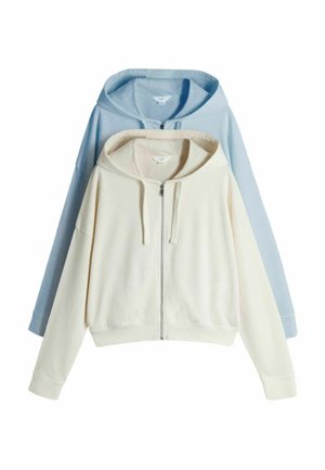 Two zip-up hoodies, one cream in front and one light blue behind, both with drawstrings and long sleeves.
