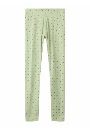 Leggings vert clair longueur totale avec petit motif floral vert foncé et large ceinture.
