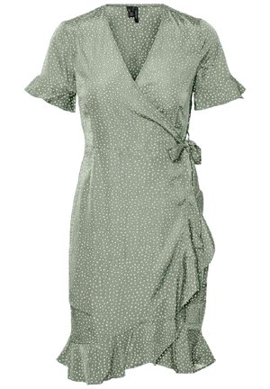 Grünes Wickelkleid mit weißen Polka-Dots, kurzen Rüschenärmeln, seitlicher Bindung und Rüschen-Saum.