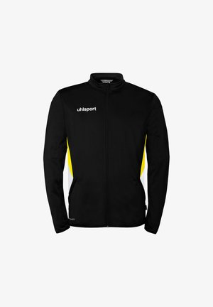 Zwart sportjack met volledige ritssluiting, gele en witte zijpanelen, "uhlsport"-logo op de linkerborst en hoge kraag.