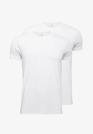White cotton t-shirts with short sleeves and round necklines, featuring a smooth, plain texture and no visible patterns or graphics.