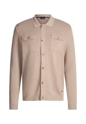 Beige vest gemaakt van een gestructureerde gebreide stof, met een knoopsluiting aan de voorkant, twee borstzakken met kleppen en geribbelde boorden en zoom.