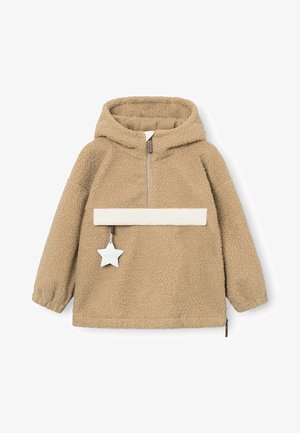 Tan fleece hettegenser med halv glidelås foran og en kremfarget horisontal stripe. Har et stjernesymbol hangende fra glidelåsen.